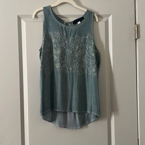 light blue/green top